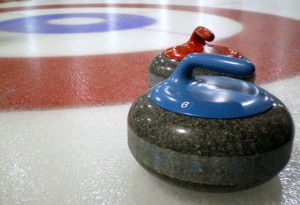 curling rocks nearing house